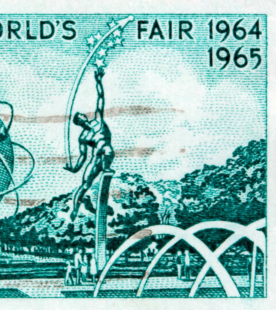 A stamp with an image of a man on top of a pole.